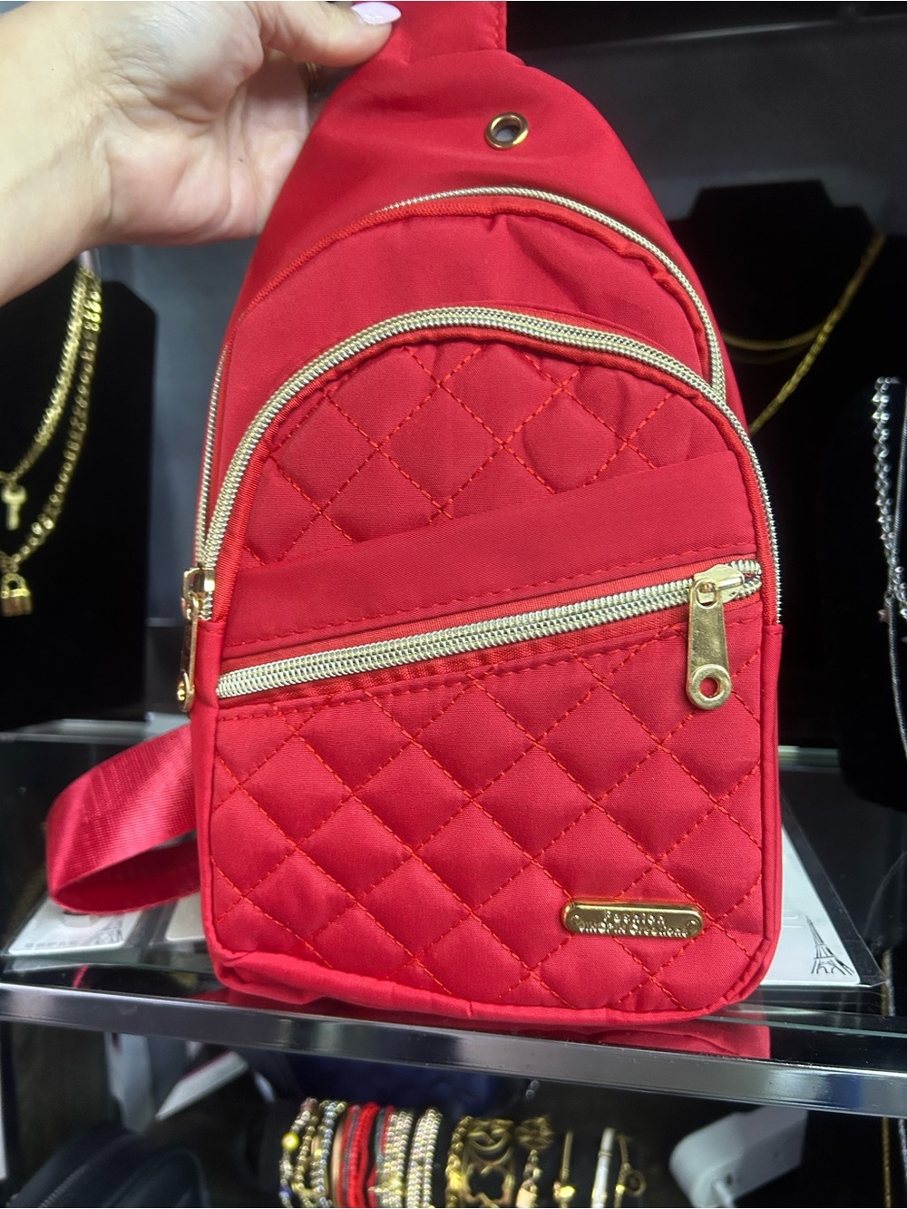 Quilted Red Sling Bag with Gold Hardware